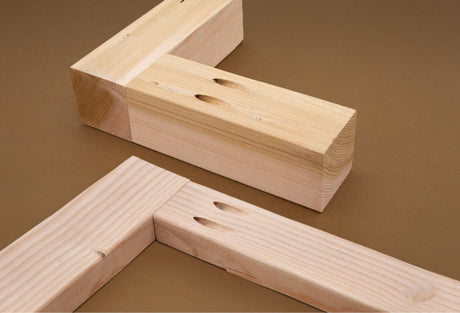 Wood joints with pocket holes in lumber, demonstrating woodworking joinery technique