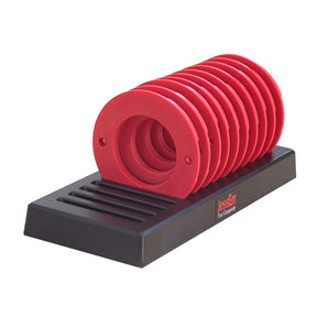 Red router table insert rings organized on a black rack for woodworking tools