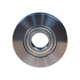 Close-up of a steel woodworking router bit bearing with smooth, polished finish