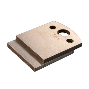 Steel woodworking planer knife blade with mounting holes on white background