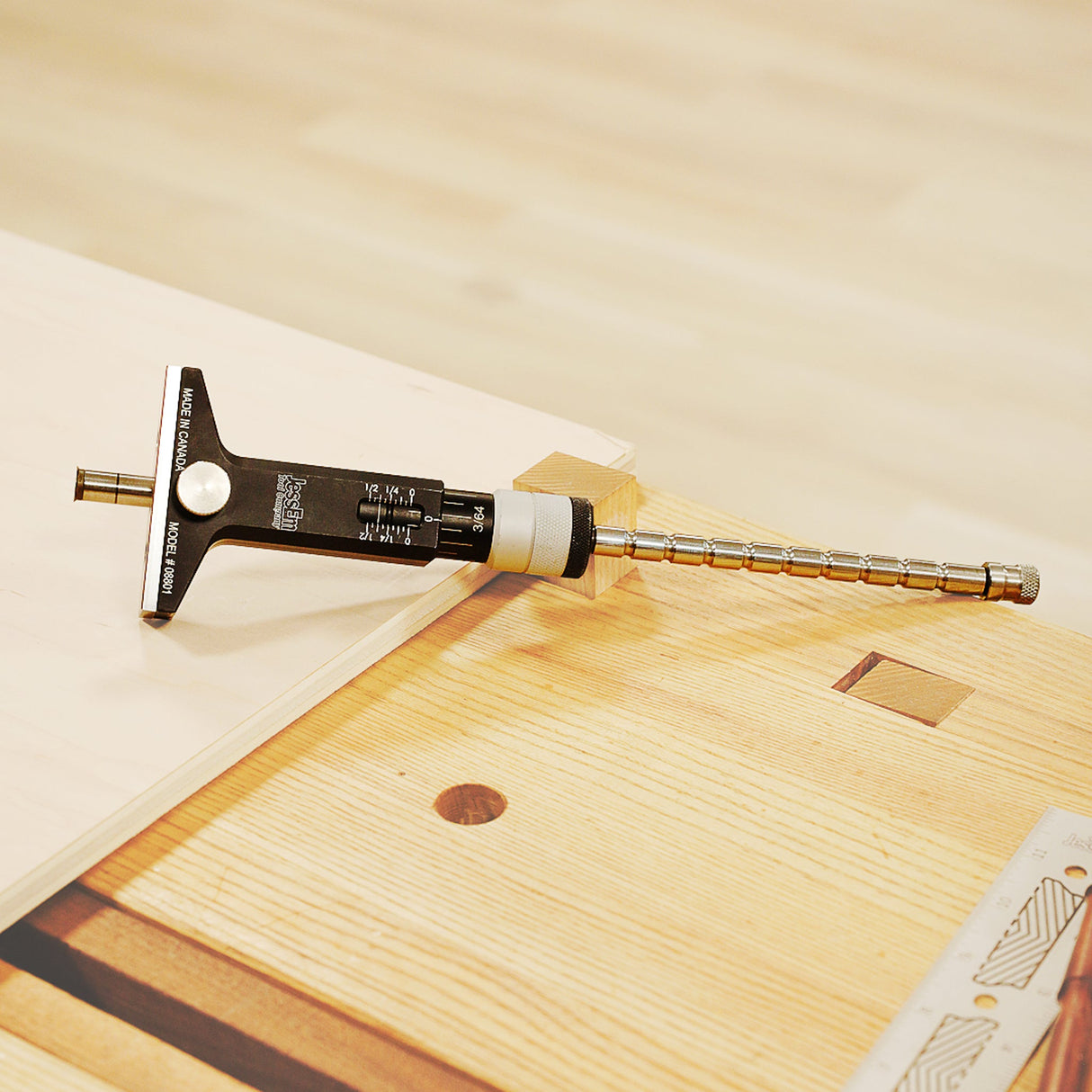 Wooden surface with a tool and a book