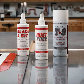Blade & Bit cleaner, Rust Free remover, and Boeshield T-9 spray on a woodworking table saw.