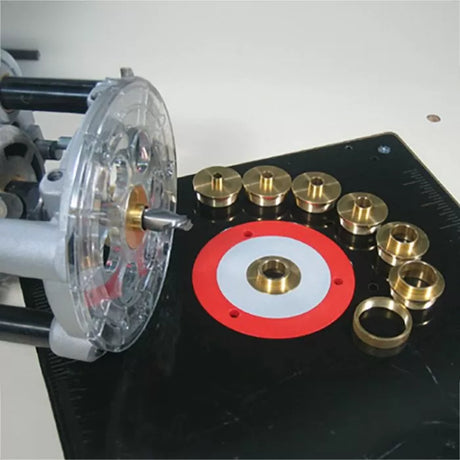 Router table brass guide bushing set with multiple inserts and clear router base plate