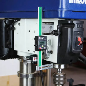 Drill press with digital depth gauge mounted for precision woodworking measurements
