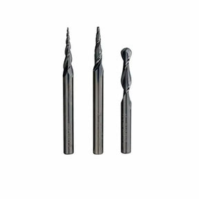 Three spiral router bits for woodworking, each with different flute designs