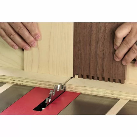 Using a dado blade on a table saw to cut finger joints in wood for woodworking projects