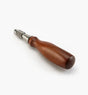 Carpenter's screwdriver with polished wood handle and metal shaft on white background