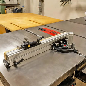 Precision table saw with miter gauge and fence setup in woodworking shop