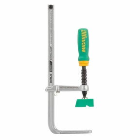Dovetail clamp with metal bar and green handle for woodworking and precise clamping tasks