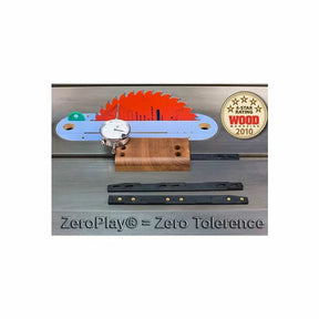 Table saw alignment gauge kit with dial indicator, miter bars, and saw blade on metal surface