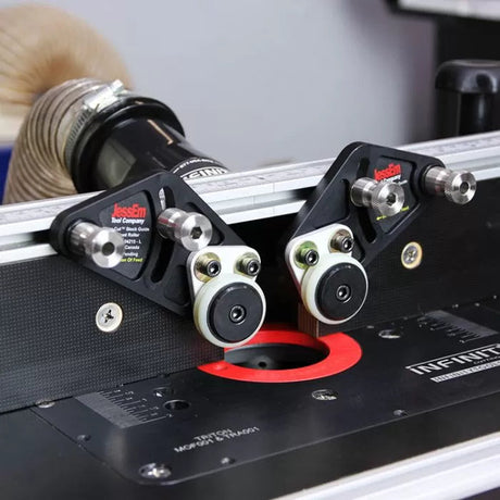 Router table setup with dual stock guides and dust collection, ideal for woodworking precision