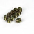 Threaded brass inserts for woodworking on white background, hardware for wood projects