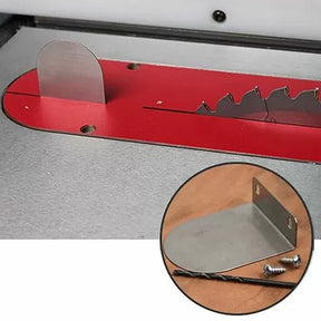 Table saw splitter attachment with red throat plate, mounting hardware, and drill bit