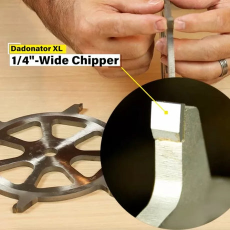 Close-up of Dadonator XL 1/4 inch wide chipper blade for woodworking dado set on table.